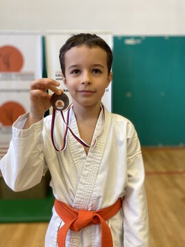 Prvo tekmovanje in prva medalja